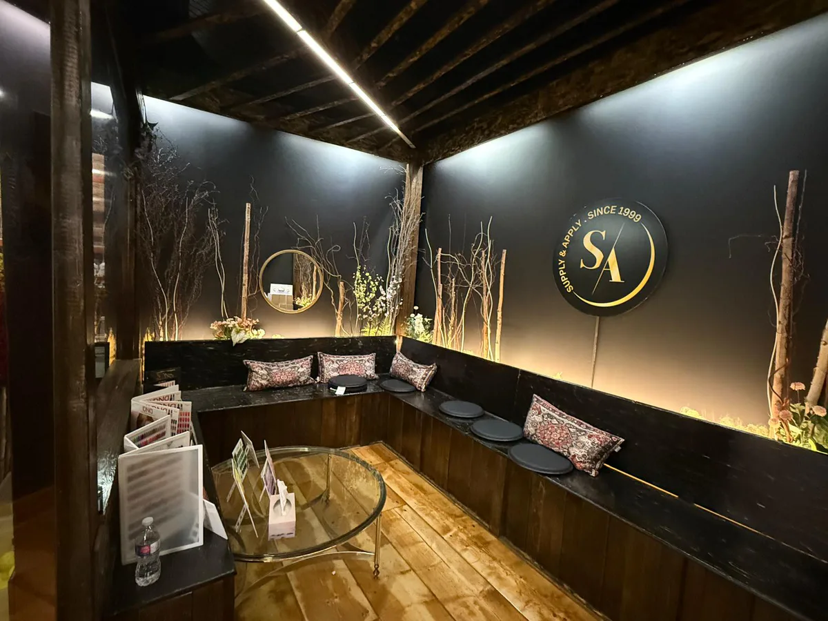 Timber-lined consultation room with integrated lighting and built-in seating.